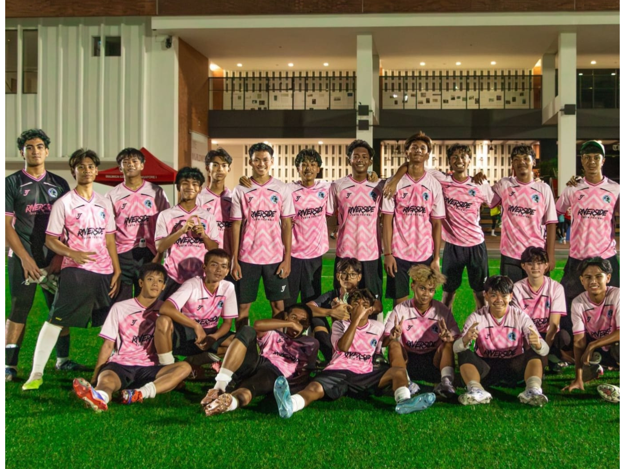 Team photo in pink jerseys